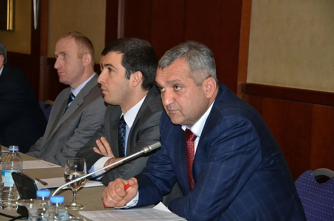 Tsezar Chocheli at a conference table